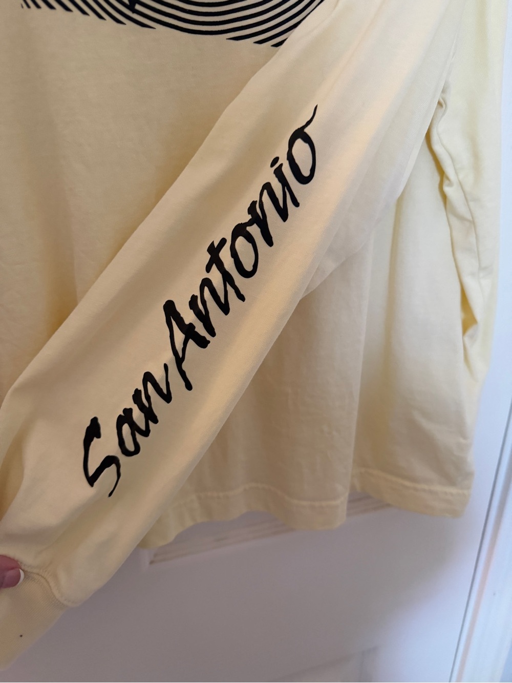 Nike Long Sleeve Tee in Pale Yellow with Black Spurs Graphic - Picture 2 of 5